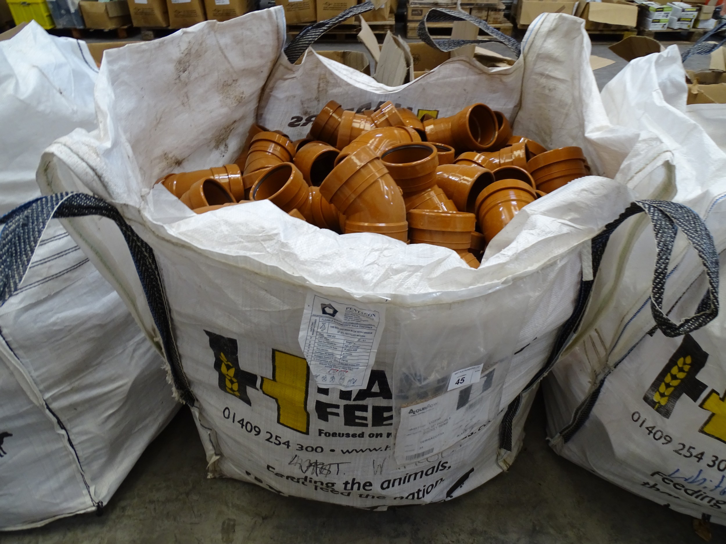 Vat. A quantity of Aquaflow 110mm terracotta 45° double socket bends ...