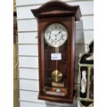 A Vintage Wall Mounted clock by 