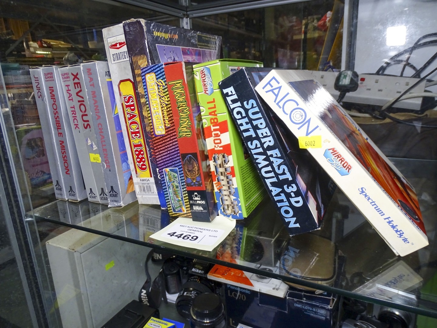 A quantity of vintage video games by Atari for the 7800 & Amiga systems