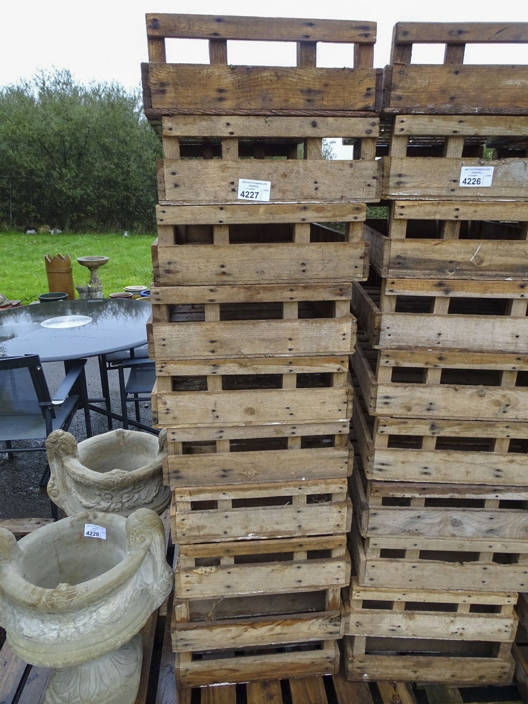 A stack of 10 fruit crates