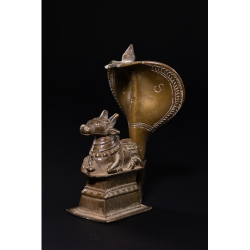 141 - A DECCAN BRONZE NAGA-NANDI SHRINE SCULPTURE, 19TH CENTURY. - A traditional Indian ritual sculpture f... 