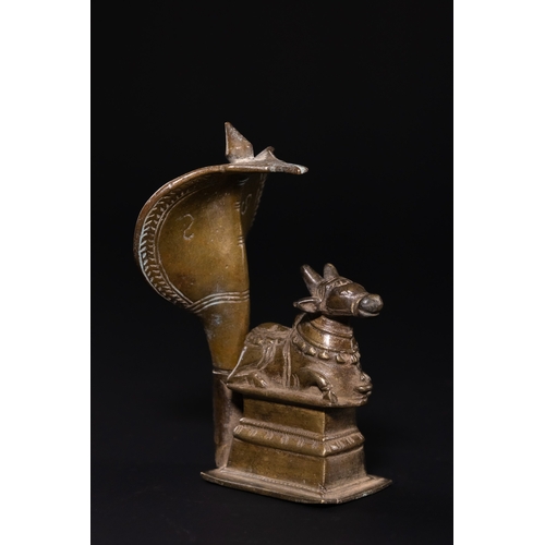 141 - A DECCAN BRONZE NAGA-NANDI SHRINE SCULPTURE, 19TH CENTURY. - A traditional Indian ritual sculpture f... 