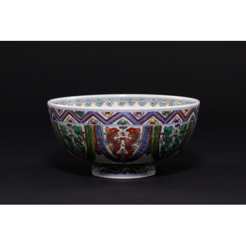 227 - A CHINESE PORCELAIN DOUCAI 'MYTHICAL BEAST' BOWL, YONGZHENG MARK. - A finely potted porcelain bowl w... 