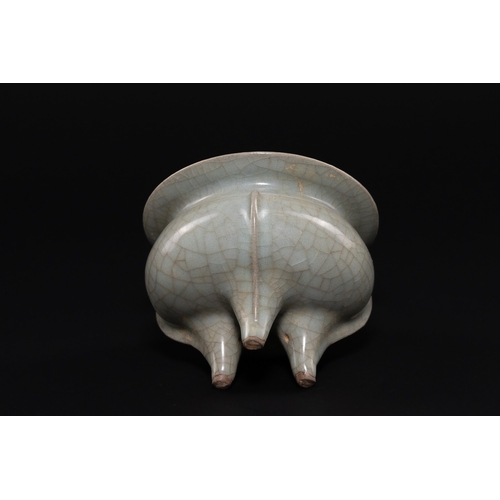 231 - A CHINESE CELADON-GLAZED STONEWARE TRIPOD CENSER. - The vessel is expertly modelled after the archai... 