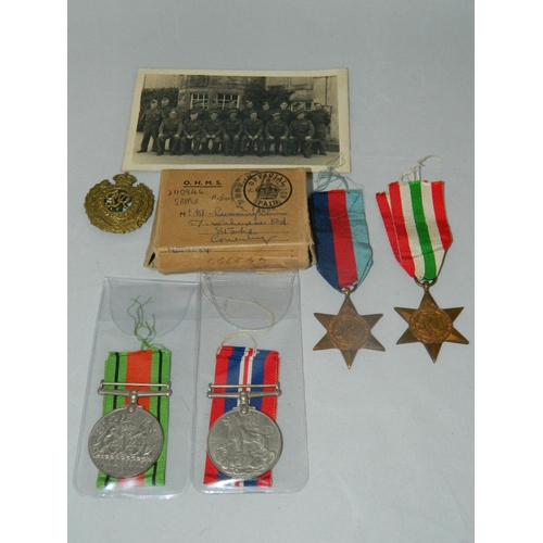 28 - WWII Royal Engineer medal in original box and other medals , also cap badge and photo