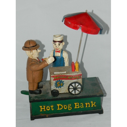 50 - Metal 'hot dog' novelty money bank with moving mechanical arm