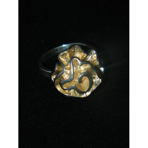 261 - Large heavy silver flower ring, stamped 925 [size R]