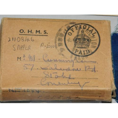 28 - WWII Royal Engineer medal in original box and other medals , also cap badge and photo