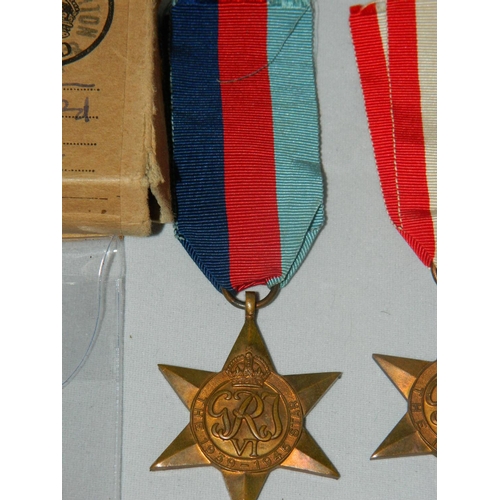 28 - WWII Royal Engineer medal in original box and other medals , also cap badge and photo