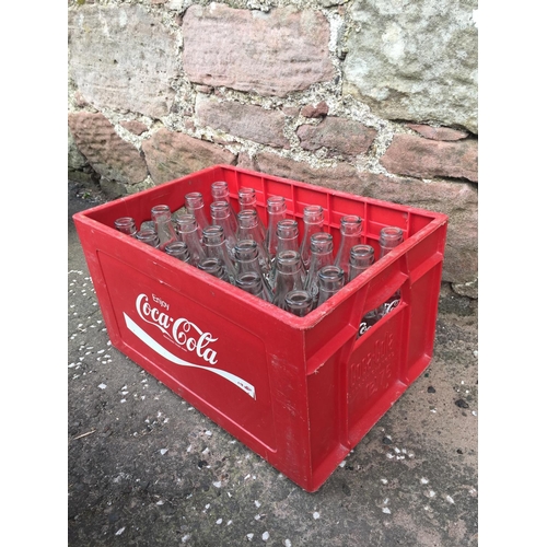 45 - 1976 Iconic Coke crate with 24 glass Coke bottles