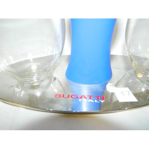 19 - Bugatti oil and vinegar set on stand in shape of lady in blue