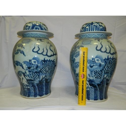 62 - Large pair of oriental lidded vases [approx 50cm]