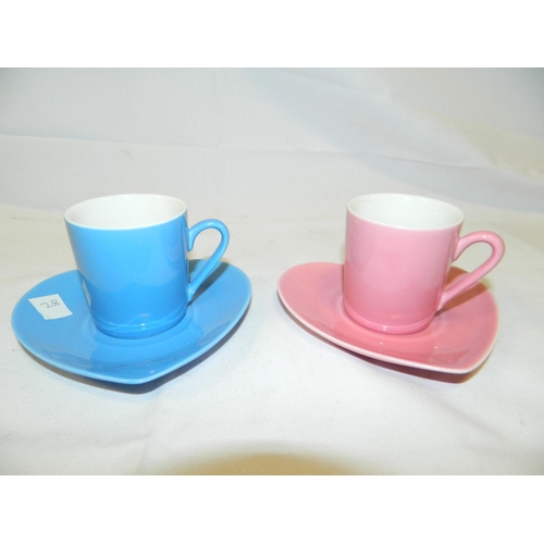 9 - 2 heart shaped bone china saucers and coffee cups