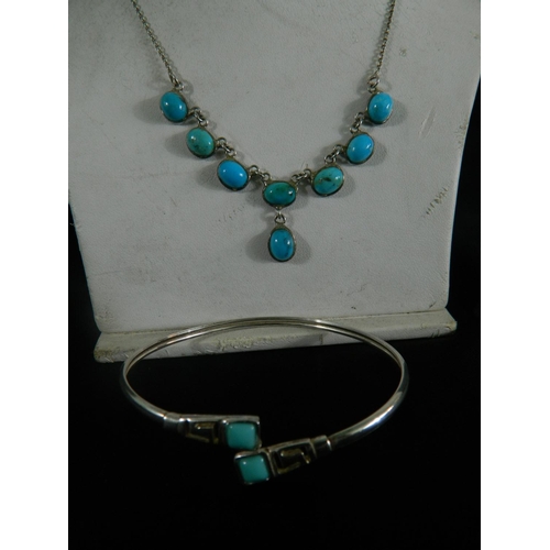 108 - Silver necklace and bangle set with blue stones