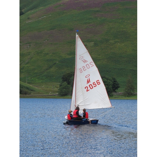 4 - Miracle dinghy. Has been adapted for a spinnaker. Has alloy mast and boom, main sail, jib and spinna... 