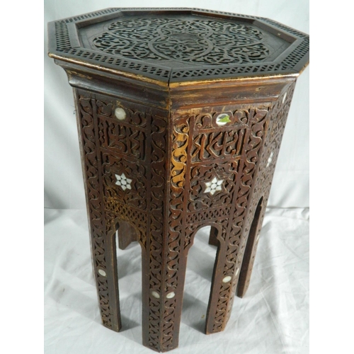 44 - Heavily carved occaisional table with mother of pearl inlay