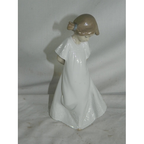 82 - NAO figure of young girl with white dress