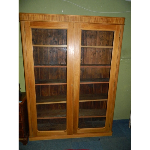 64 - Glass door bookcase in light oak, with 5 adjustable shelves [from legal office]