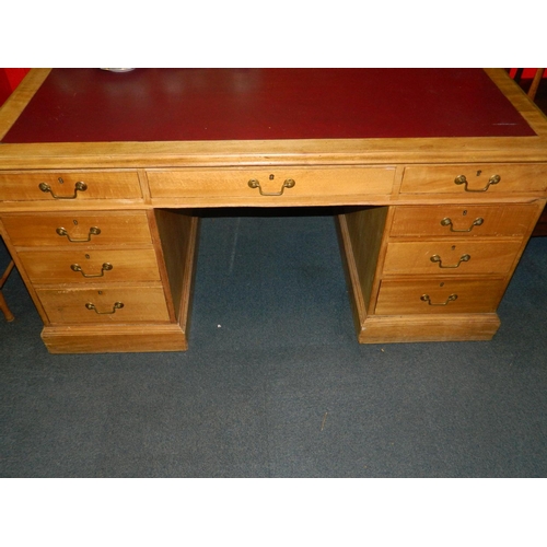 66 - Quality Edwardian drawered pedastal partners kneehole desk in light oak with red leather top