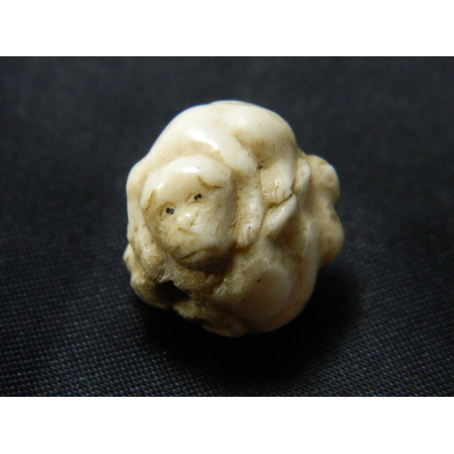 68 - 19th century carved ivory netsuke in form of 3 dogs