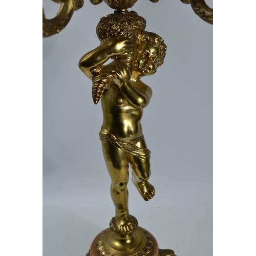 26 - Gilt seven light table lamp with cherub column