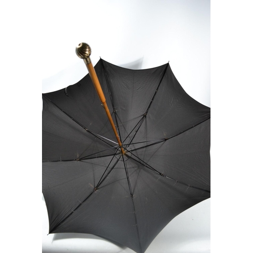 28 - Silver topped parasol with London hallmark