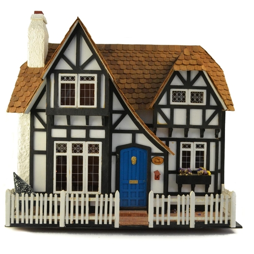 Tudor style dolls house 'The Nook' with a comprehensive collection