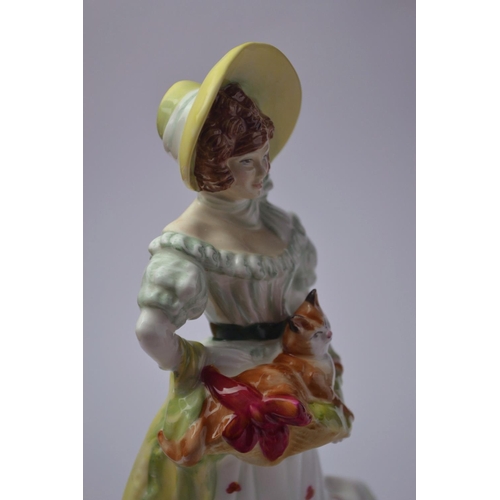 1011 - Royal Doulton 'Jane' HN3711 year 1996 approx 22cm high. 'Lady of the year 1997'
Condition: In good o... 