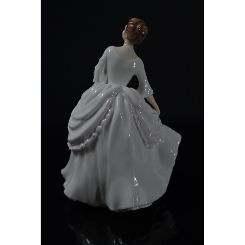 1028 - Royal Doulton 'Carol' HN2961 year 1981 figurine approx 20cm high. Modelled by P.PARSONS
Condition: I... 