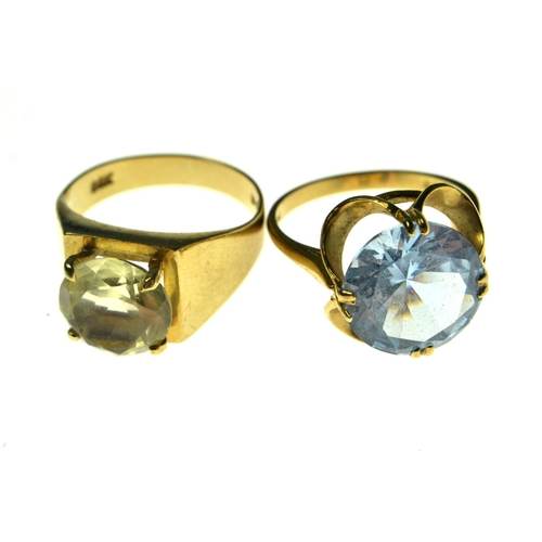 103 - 9ct Gold ring set with large pale blue Topaz, [ stamped 375] and a 9ct Gold ring set with citrine [s... 