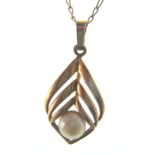 104 - 9ct gold pearl set pendant of leaf design, stamped 9ct chain