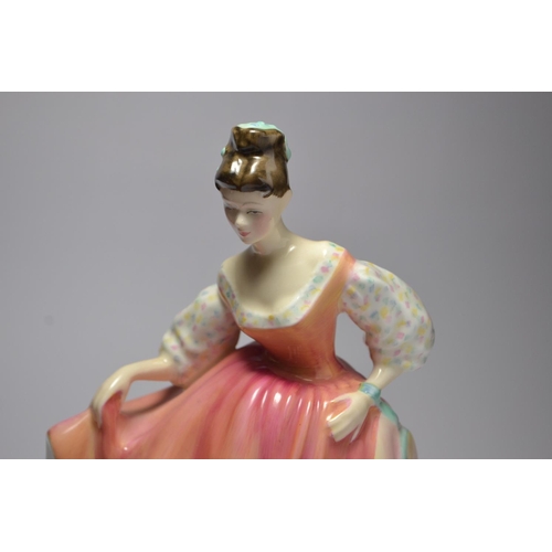 1044 - Royal Doulton 'Fairlady (Coral Pink)' HN2835 year 1962 approx 19cm high
Condition: In good order, no... 