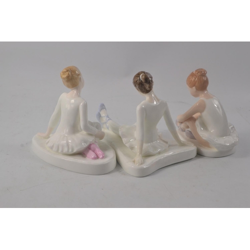 1052 - Three Royal Doulton figures 'Ballet Shoes' HN3434 1992 model (approx 9cm tall), 'Star Performer' HN3... 