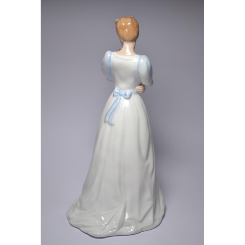 1053 - Royal Doulton 'Kimberley' HN3379 1992 model by 'TIMOTHY POTTY' approx 22 cm tall
Condition: In good ... 