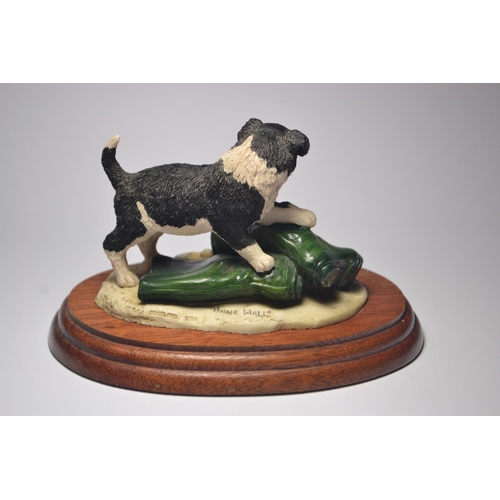 1067 - Two Anne Wall Border Fine Art puppy and kitten models on stand both Made in Scotland 'If the cap fit... 