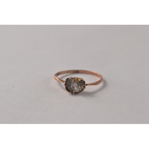 107I - 9ct Yellow gold ring with loose set paste stone [size O] 0.9grm approx