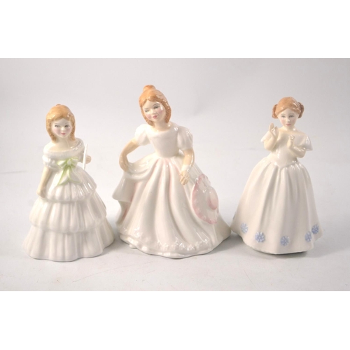 1134 - Three Royal Doulton figures to include 'Amanda' HN2996 approx 14cm tall, 'Julie' HN2995 approx 12cm ... 