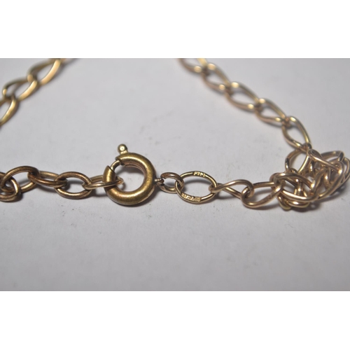 134 - 9ct gold spriga style bracelet stamped 375 on indivual links. Weight: 2.3g