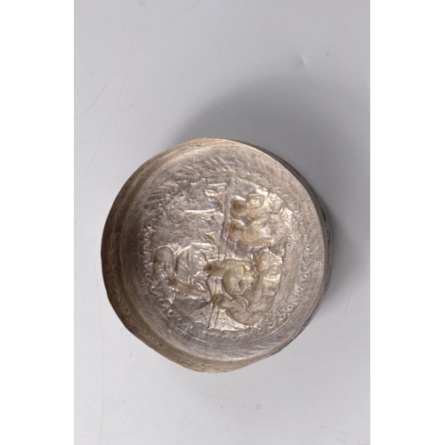 169G - Unusual Oriental silver circular lidded box with traditional intricate decoration to the base and li... 