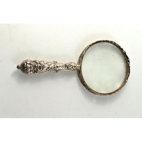 169H - Heavily Embossed London Silver Magnifying Glass and oval white metal picture frame