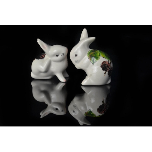 17 - Pair 'Wemyss' pottery bunnies by Griselda Hill with leaf and berry design, SB to base. [8 & 7cm high... 