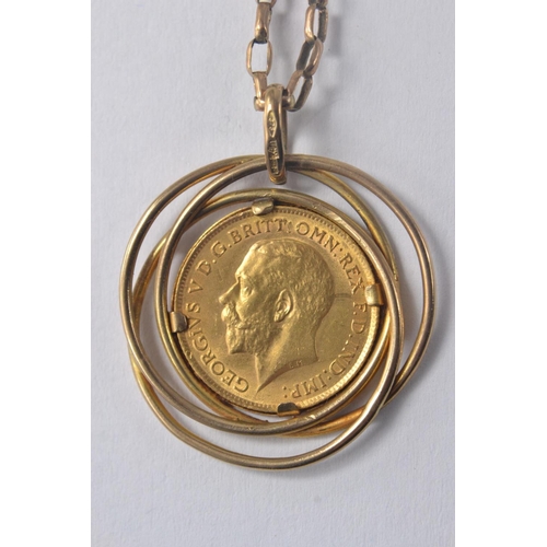 173L - 1912 George V Gold Half Sovereign mounted in a 9ct open triple circular design suspended from a 9k [... 