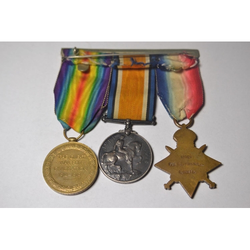 177 - Bar of three medals to include 1914/15 star medal for Private R.L.Turnbull stamped 12958, British wa... 