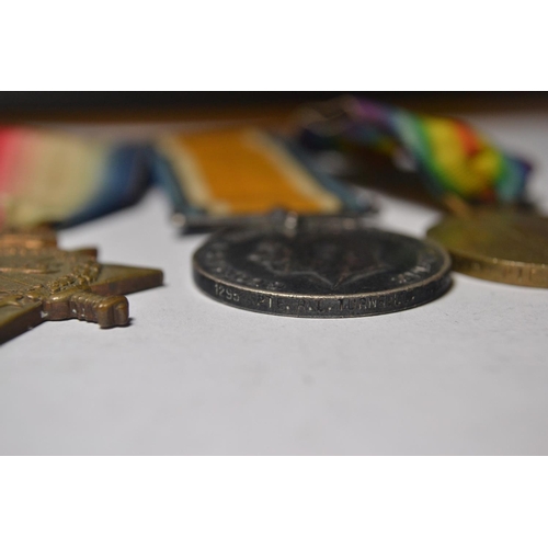 177 - Bar of three medals to include 1914/15 star medal for Private R.L.Turnbull stamped 12958, British wa... 