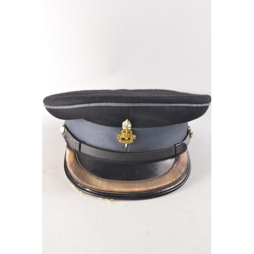 181 - Two R.A.E.C (Royal Army Education Corps) dress hats to include a dress hat No 1 and an SD cap