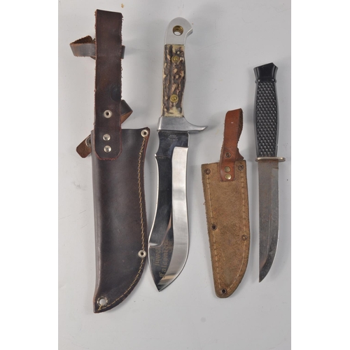 184 - CK Stainless Jewell Falconire hunting knife and one other