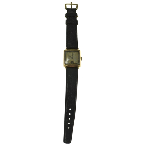 197 - TREBEX 9ct gold case ladies wrist watch of square form with leather strap, [over wound] strap bar sn... 