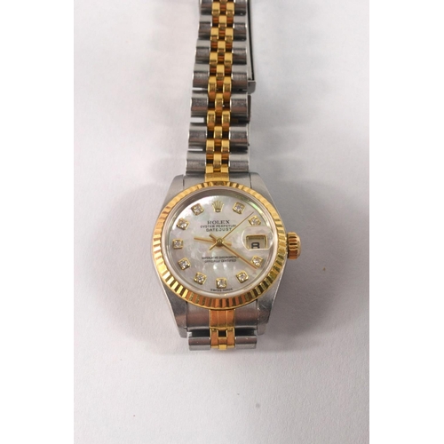 200A - Ladies ROLEX watch with Mother of pearl and diamond face (in original box). Has a valuation certific... 