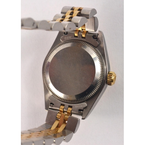 200A - Ladies ROLEX watch with Mother of pearl and diamond face (in original box). Has a valuation certific... 