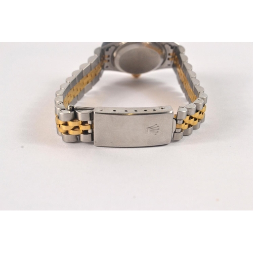 200A - Ladies ROLEX watch with Mother of pearl and diamond face (in original box). Has a valuation certific... 